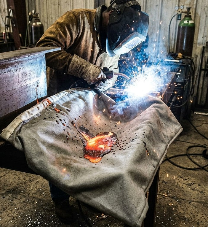 molten metal held in a welding blanket